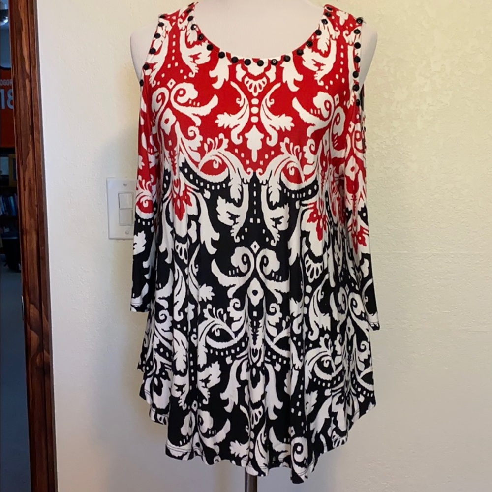 Red and black cold shoulder tunic.